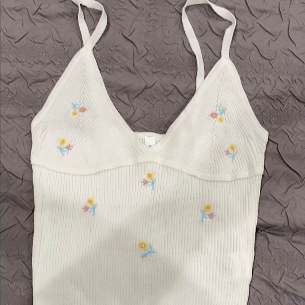 Cropped tank. Never worn but no tag